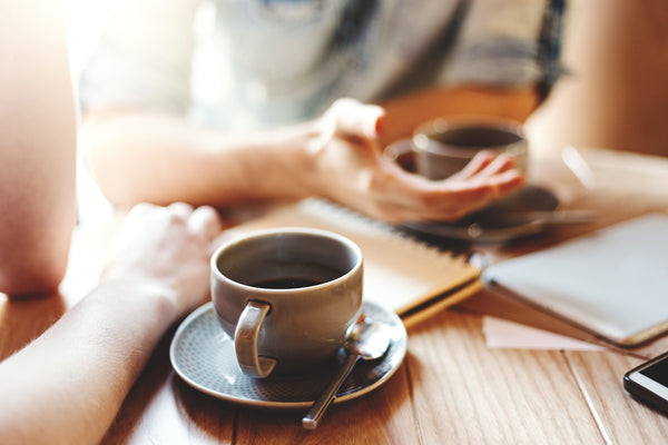 People Chatting Over Coffee - Functional Mushrooms  - Health benefits - Holistic Wellness -  Energy - Sleep - Mood Balance - Brain Health - Lion’s Mane - Reishi - Cordyceps - Troomy Nootropics in Whittier, CA