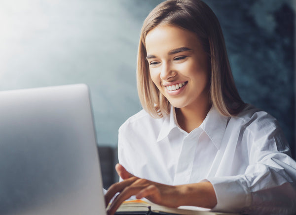 Workplace Efficiency - Woman Working at Computer - Functional Mushrooms  - Nootropics - Adaptogens - Health benefits - Holistic Wellness  - Troomy Nootropics in Whittier, CA
