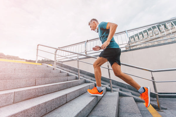 Functional Mushrooms for Men - Man Runs up Stairs - Working Out - Troomy Nootropics in Whittier, CA