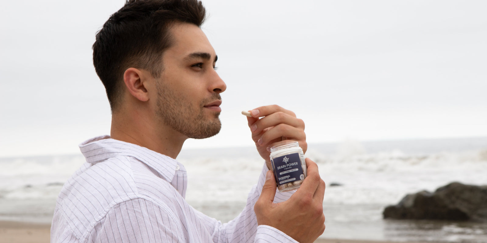 Brain Power - Lion’s Mane and Cordyceps - Capsule Form - Focus and Energy - Capsule Bottle in Hand - Troomy Nootropics in Whittier, CA
