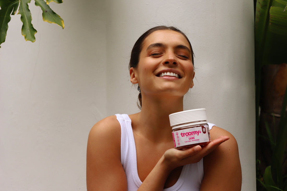 Shine - Tremella and Biotin - White Peach Pomegranate - Beauty Support -  Woman Smiling with Gummies - Troomy Nootropics in Whittier, CA
