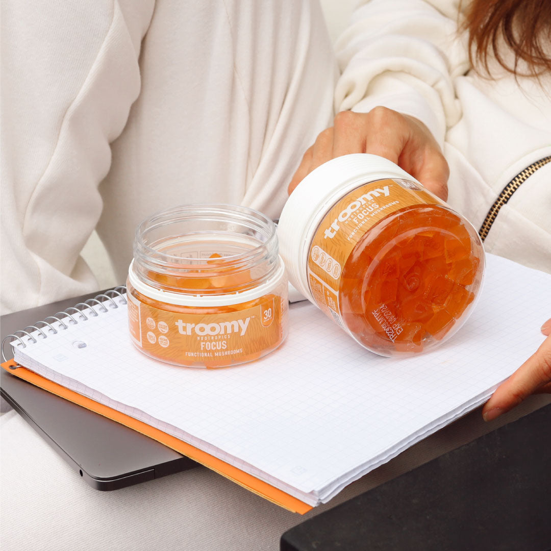 Focus - Lion’s Mane - Tangerine Passionfruit - Focus Support - Closeup Image of Jars with Notebook - Troomy Nootropics in Whittier, CA