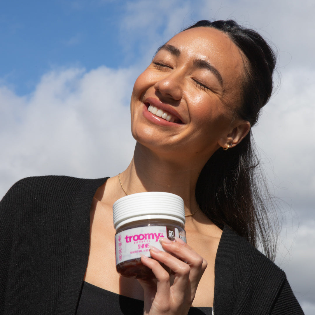 Shine - Tremella and Biotin - White Peach Pomegranate - Radiance Boost - Woman with Jar - Troomy Nootropics in Whittier, CA